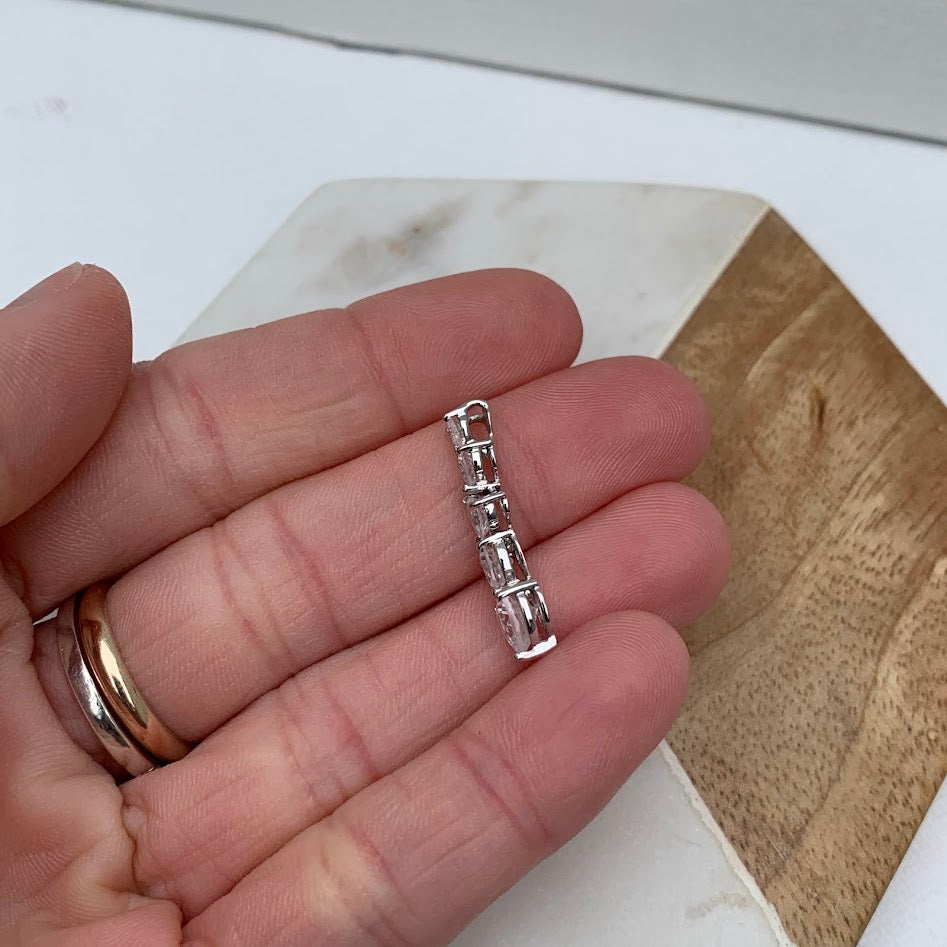 10K White Gold Graduated Heart CZ Pendant